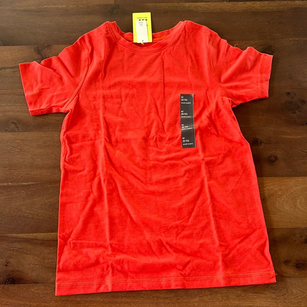 NWT youth medium all in motion orange short sleeve shirt
